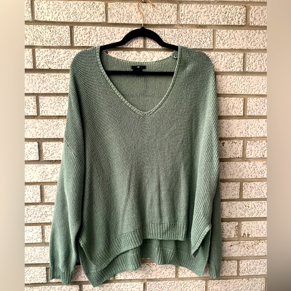 Green, slouchy sweater